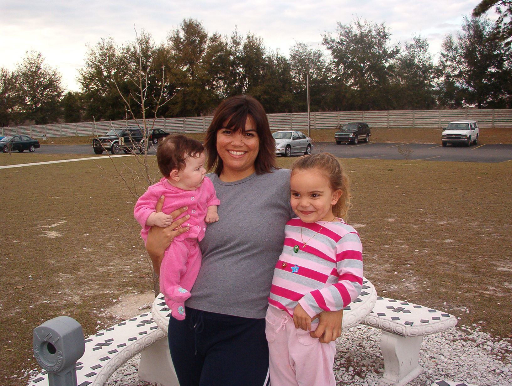 Advertising Salesperson Adria Byers and her children
